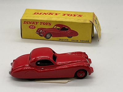 Lot 75 - DINKY; a boxed Jaguar 157, red.