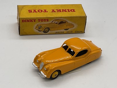 Lot 76 - DINKY; a boxed Jaguar XK120, 157, yellow.