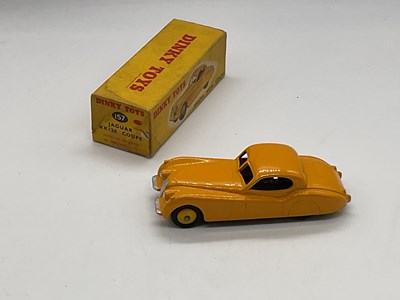 Lot 76 - DINKY; a boxed Jaguar XK120, 157, yellow.