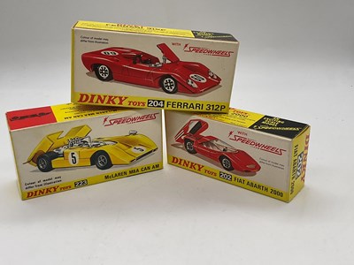 Lot 72 - DINKY; three boxed Speed Wheels, Models 204,...