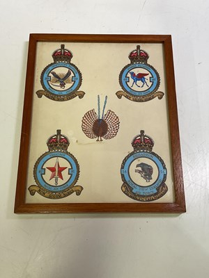 Lot 217 - Four paintings of Air Force squadron badges,...