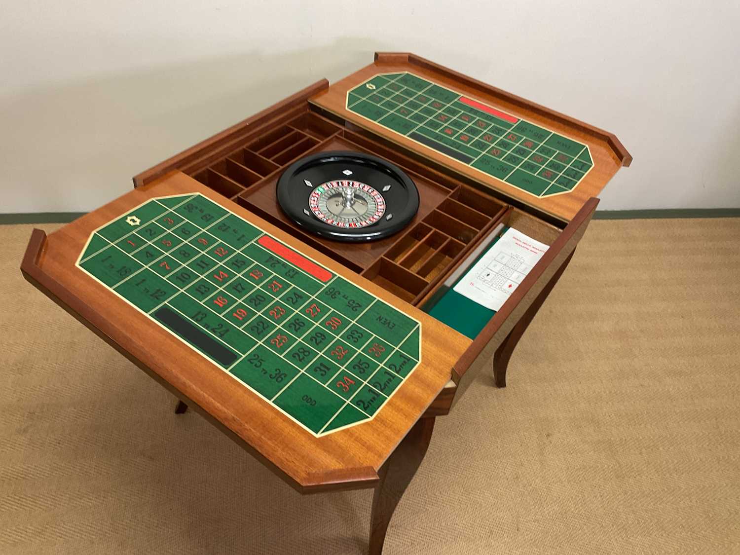 Lot 676 A contemporary flip top games table with