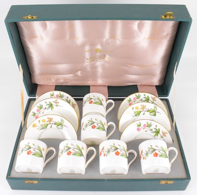 Lot 305 - MINTON; a cased coffee set in the 'Meadow'...