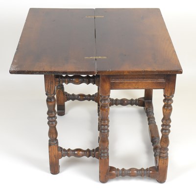 Lot 57 - A reproduction oak short gateleg coffee table...