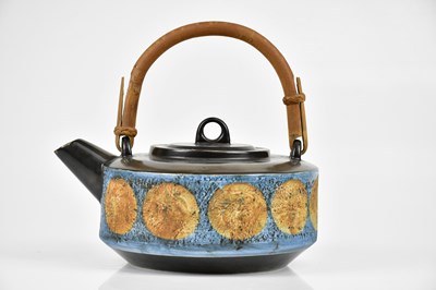 Lot 37 - TROIKA POTTERY; a teapot with bamboo handle,...