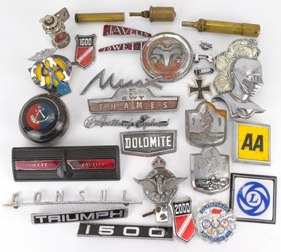Lot 129 - Various vintage car and truck mascots, decals,...