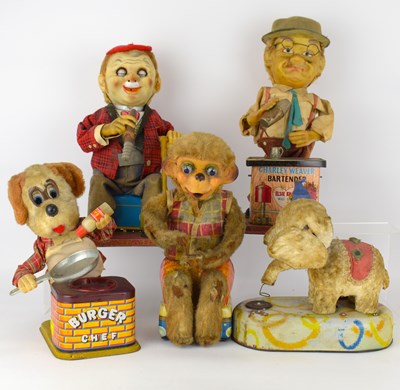 Lot 260 - Five vintage Japanese battery-operated toys,...