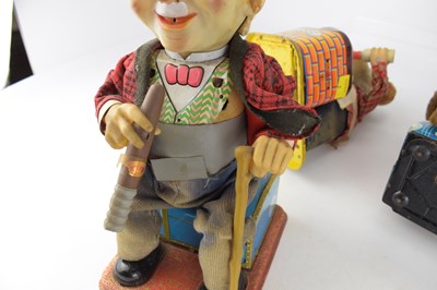 Lot 260 - Five vintage Japanese battery-operated toys,...