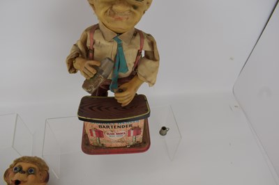 Lot 260 - Five vintage Japanese battery-operated toys,...