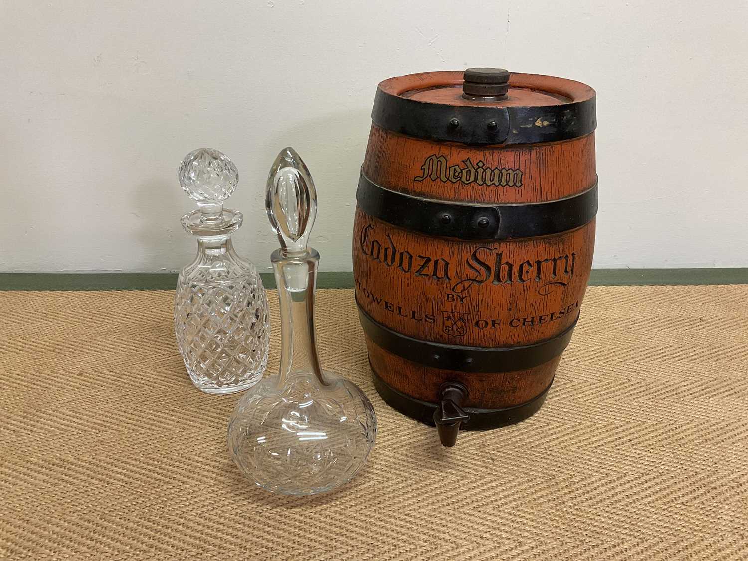 Lot 38 - A Cadoza sherry barrel, height 34cm, with two...