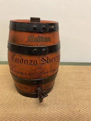 Lot 38 - A Cadoza sherry barrel, height 34cm, with two...