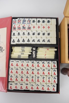 Lot 214 - A cased carved wooden chess set, and a cased...