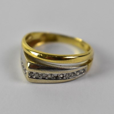 Lot 1023 - A 14ct white and yellow gold ring