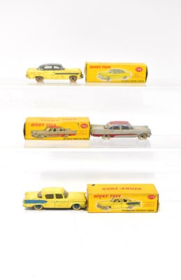 Lot 376 - DINKY; three boxed saloon cars, comprising...