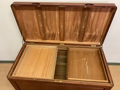 Lot 776 - A hardwood chest with two inner trays, height...