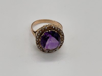 Lot 397 - A 9ct yellow gold amethyst and pearl ring with...