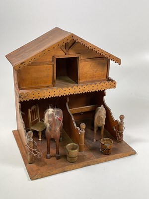 Lot 69 - A French Lenoble stable in varnished wood, the...