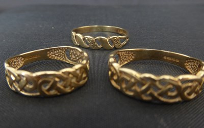 Lot 1069 - Three 9ct gold openwork Celtic design rings