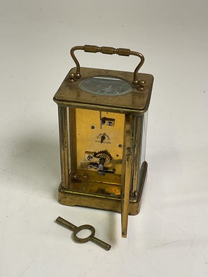 Lot 606 - Aiguilles brass carriage clock with key and...