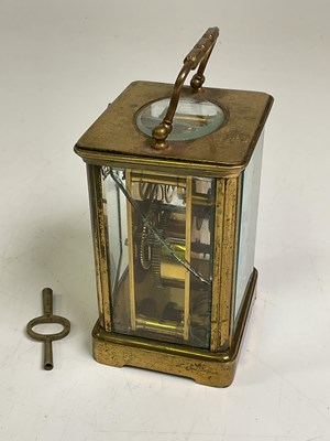 Lot 606 - Aiguilles brass carriage clock with key and...