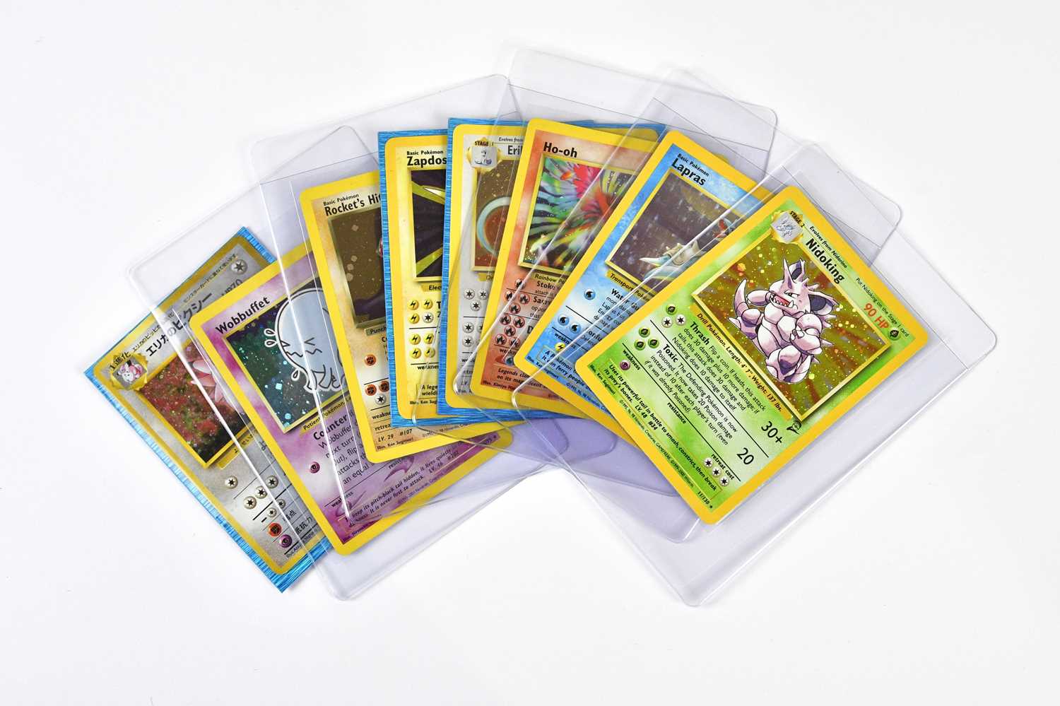 Lot 4433 - POKÉMON; seven holographic Pokémon cards, to...