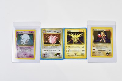 Lot 4433 - POKÉMON; seven holographic Pokémon cards, to...