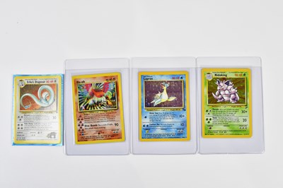 Lot 4433 - POKÉMON; seven holographic Pokémon cards, to...