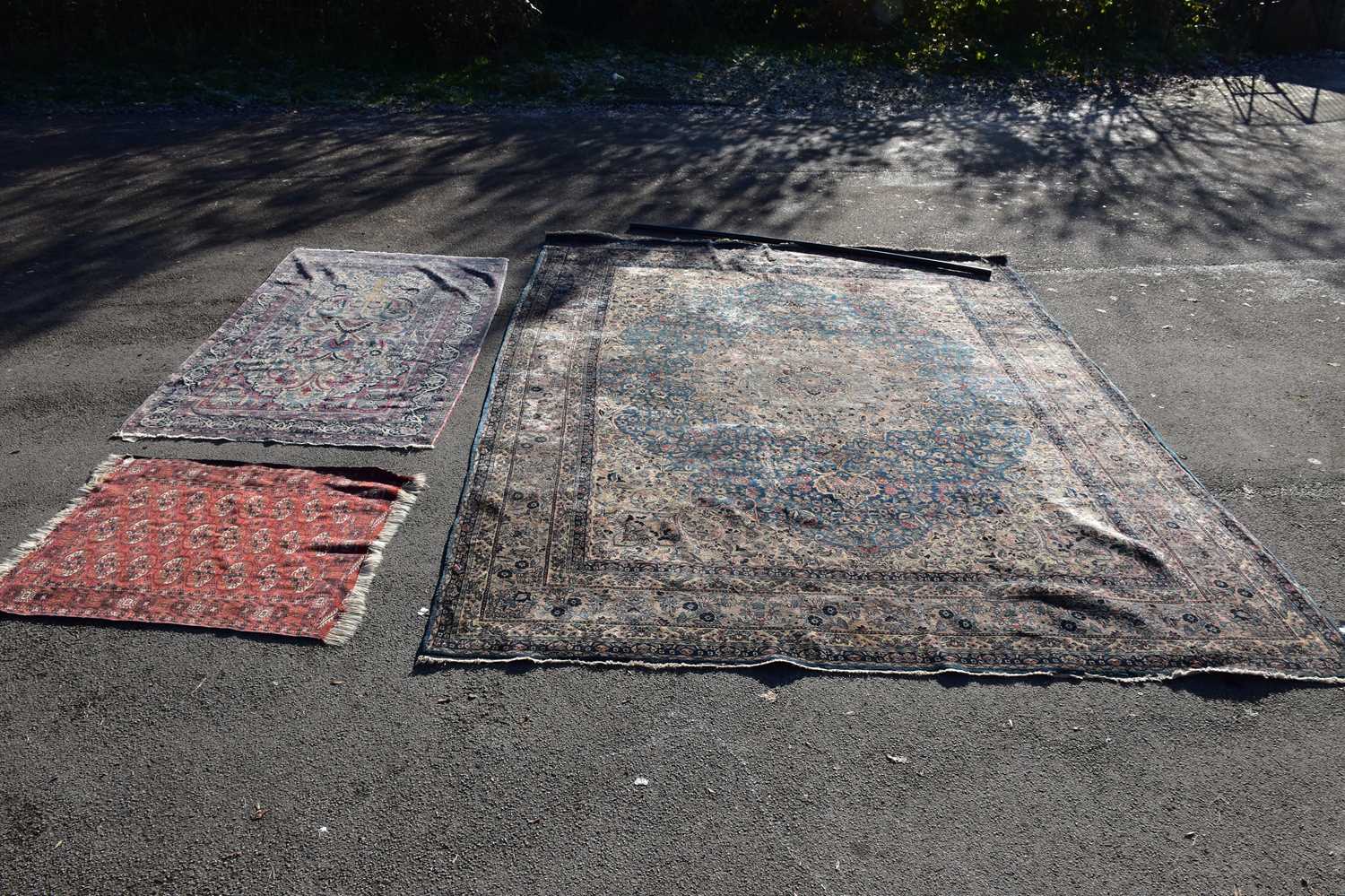 Eastern Style Rugs Lot 6478 - A large Eastern style rug with floral