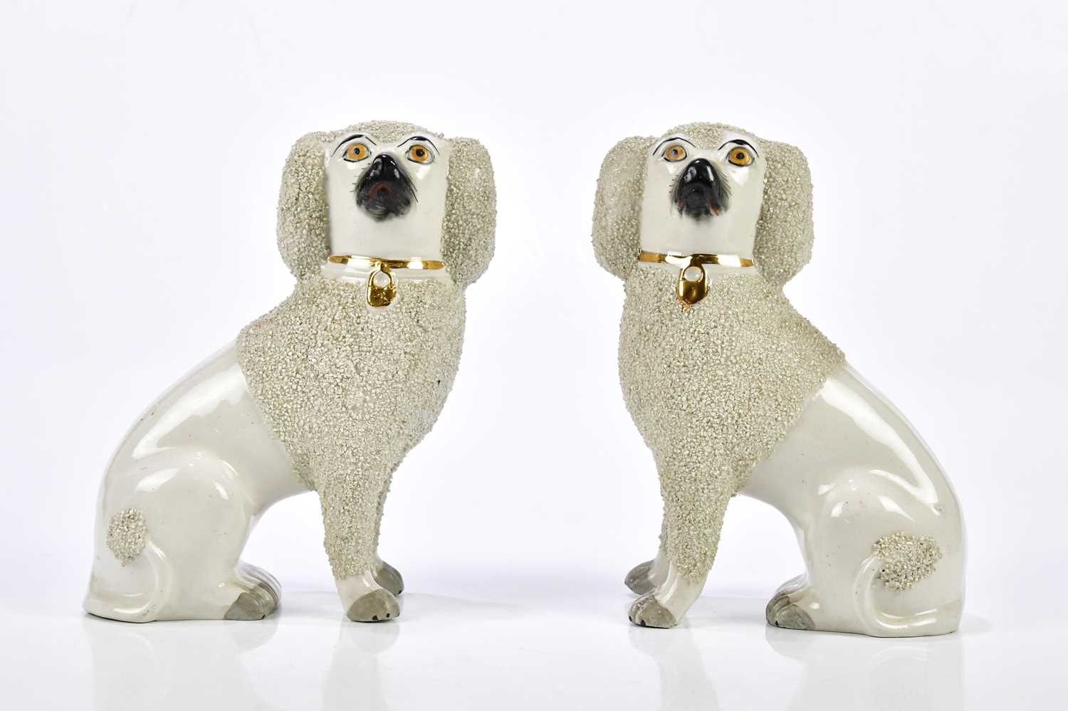 Lot 2191 - A pair of Staffordshire flat back dogs, height...