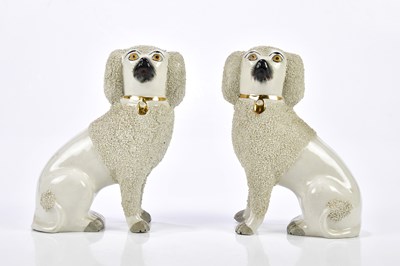 Lot 2191 - A pair of Staffordshire flat back dogs, height...