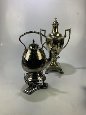 Lot 423 - A silver plated tea urn on claw feet, height...