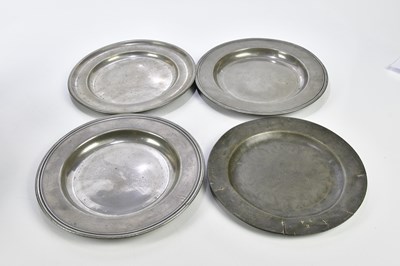 Lot 407 - A group of four pewter plates, diameter of...