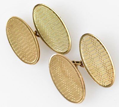 Lot 683 - A pair of 9ct yellow gold cufflinks with...