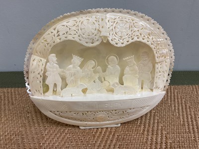 Lot 39 - RELIGIOUS INTEREST; a carved shell nativity...