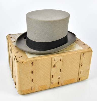 Lot 5120 - MOSS BROS; a grey top hat, size 7, boxed.