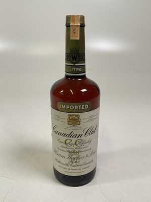 Lot 276 - A litre bottle of Canadian Club Whisky.