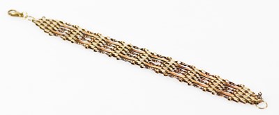 Lot 544 - A 9ct yellow gold six bar bracelet, length...