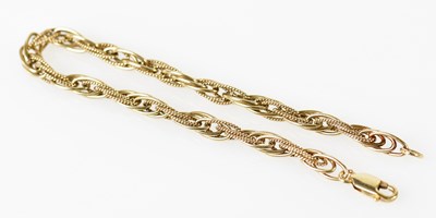 Lot 545 - A 9ct yellow gold rope twist bracelet, length...