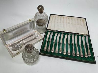 Lot 551 - Three silver topped glass dressing table...