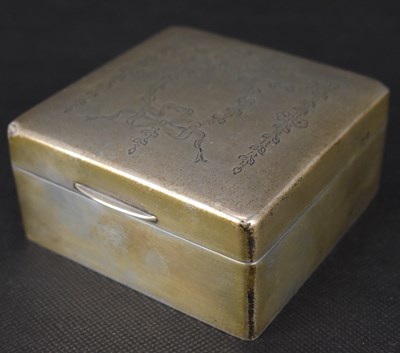 Lot 660 - A hallmarked silver cased square cigarette box...