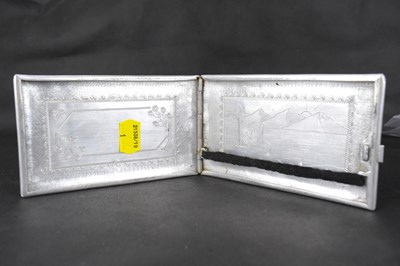 Lot 439 - An RAF fabricated aluminium cigarette case,...