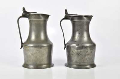 Lot 399 - A matched pair of Normandy pewter flagons with...