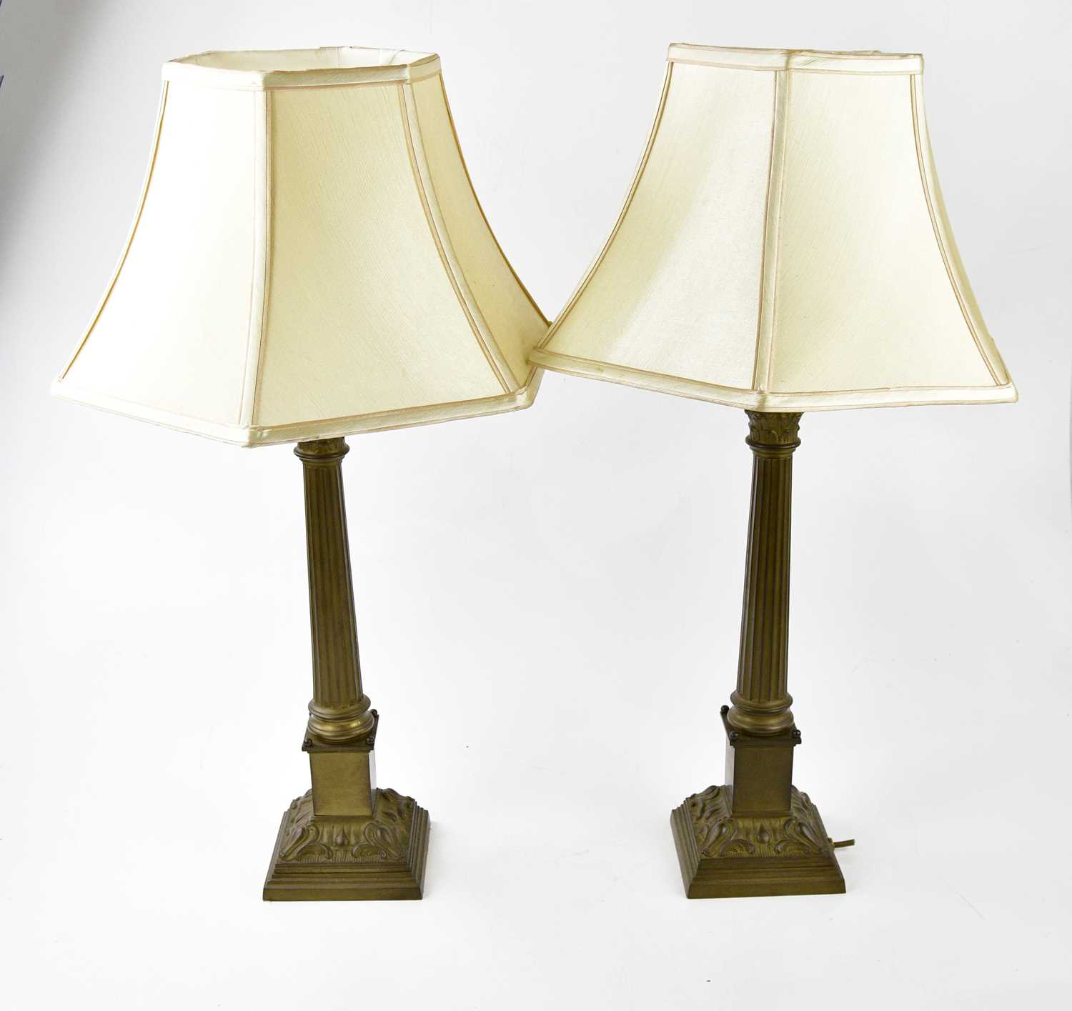 Lot 5189 - A pair of brass Corinthian column lamps,...