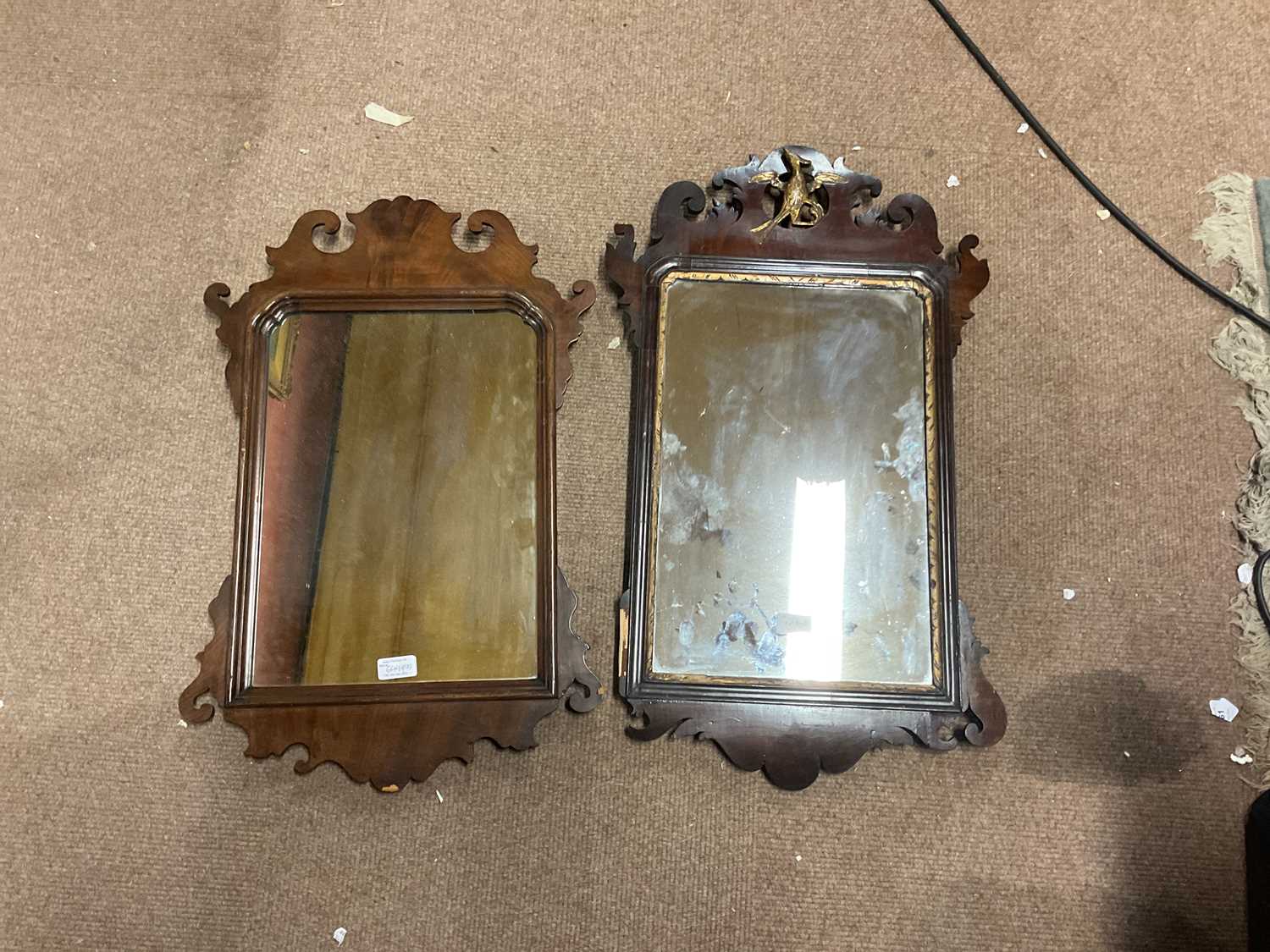 Lot 6499 - Two fretwork wall mirrors, largest 44cm x 74cm.