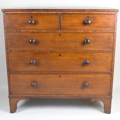 Lot 3 - An early 19th century mahogany chest of two...