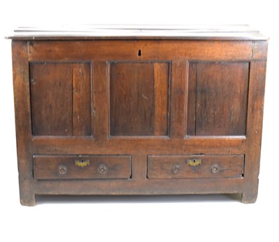 Lot 43 - An 18th century and later large oak coffer...