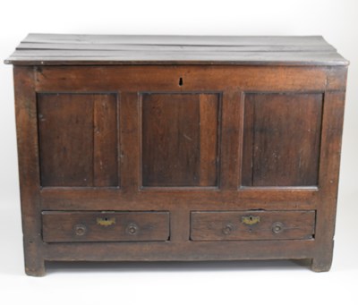 Lot 43 - An 18th century and later large oak coffer...