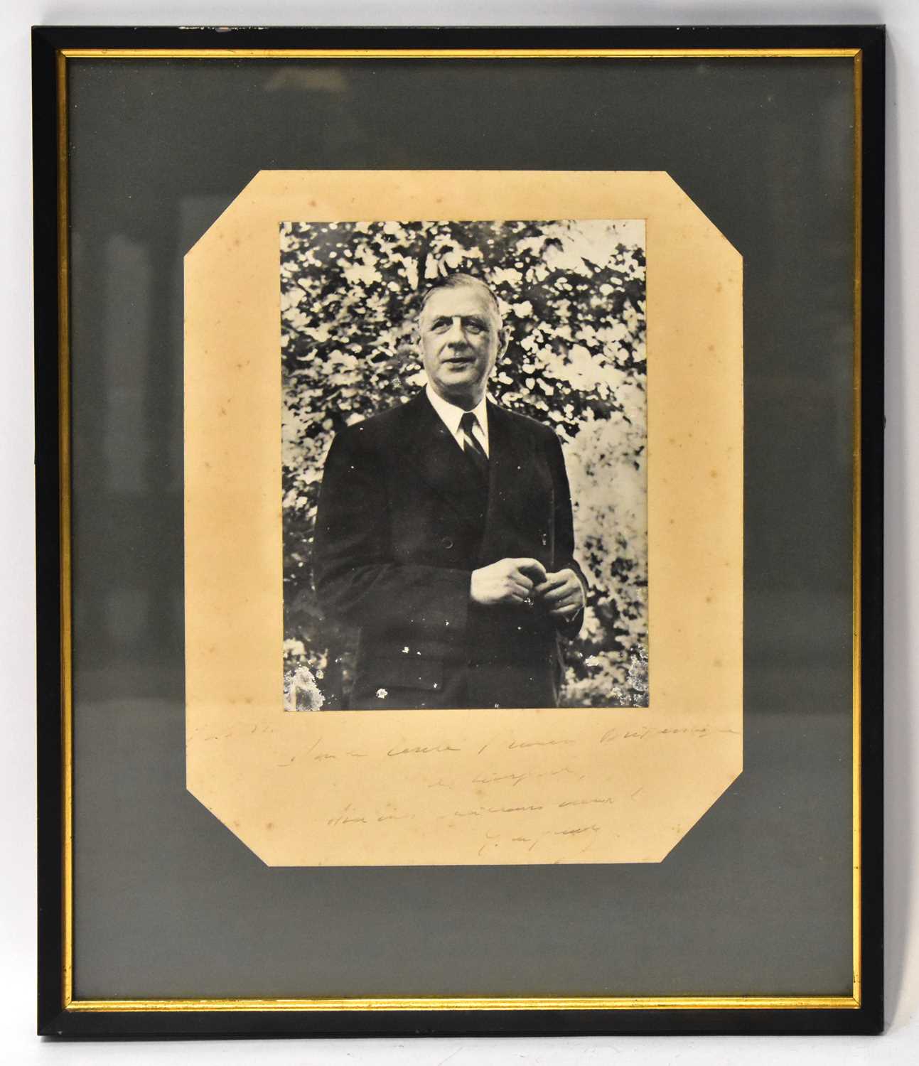 Lot 606 - CHARLES DE GAULLE; a black and white portrait...