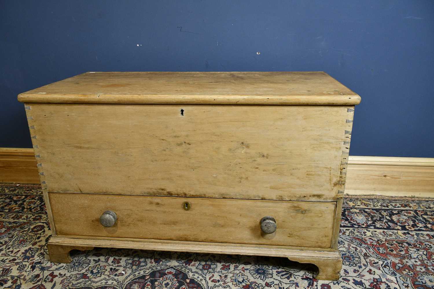 Lot 6633 An old pine blanket chest with hinged lid