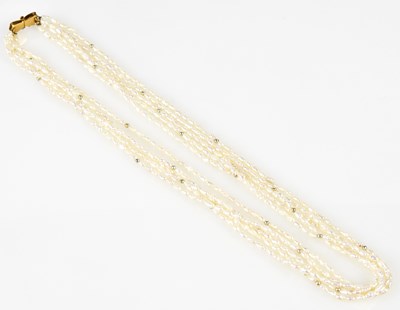 Lot 466 - A five strand pearl necklace with yellow metal...